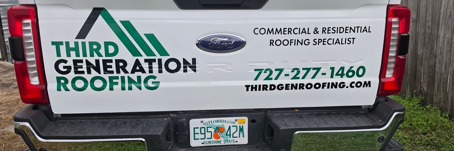 Close-up of the Ford F-350 tailgate with logo, phone number and website in cut vinyl